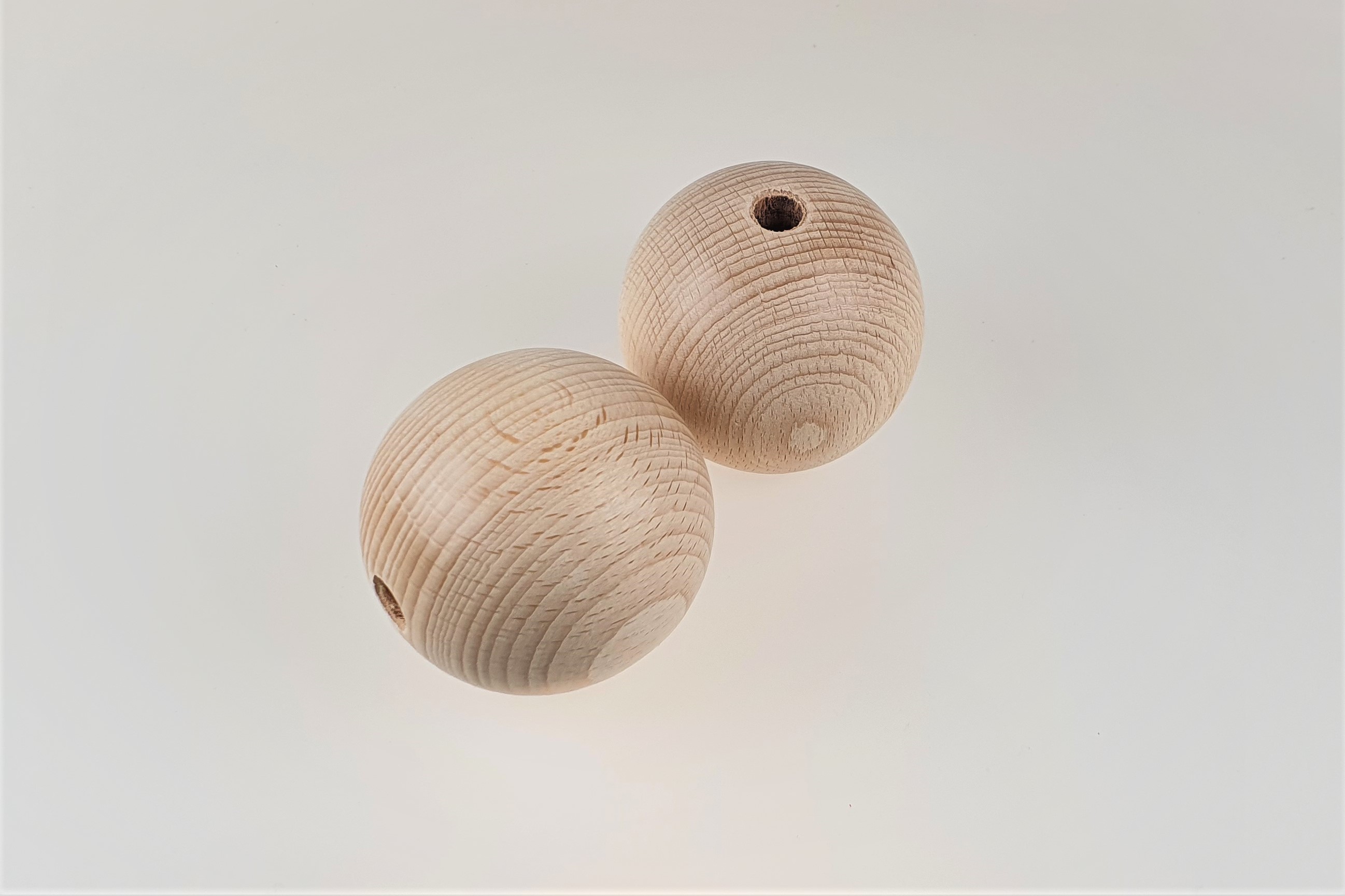 Holzkugel Ø 60 mm, 10 mm Bohrung, 1 Stück Holzkugel Ø 60 mm, 10 mm Bohrung, 1 Stück